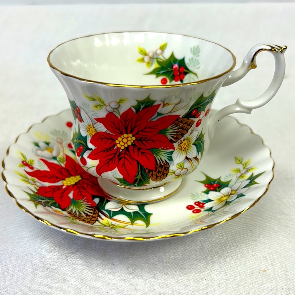 Vintage Royal Albert “ Yuletide” pattern bone china teacup and saucer England